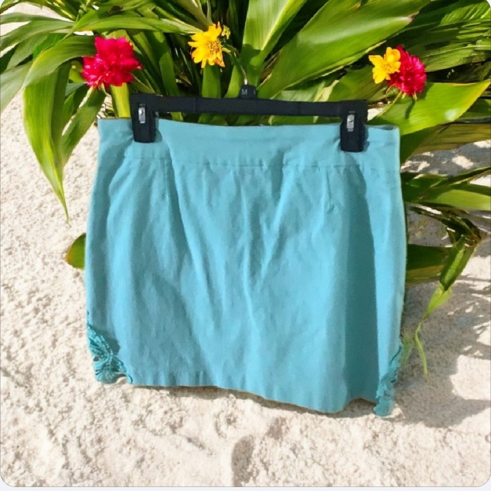 SKORT blue stretchy crocheted along the bottom corners. Size 12-14